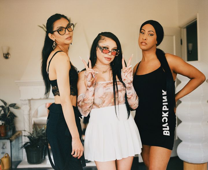 Daphne, Luna Lovebad, and Cara Cooper posing in apartment (photography by Texas Isaiah)